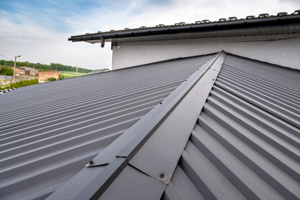 A Close Up of a Metal Roof on a House — Norwest Roof Restorations In Central Coast, NSW