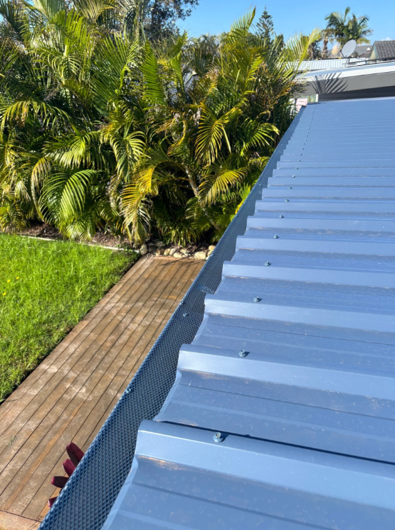 A Close up of a Roof with Gutters — Norwest Roof Restorations In Central Coast, NSW