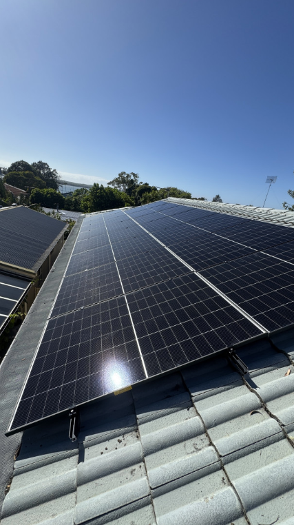 Solar Panels on a Roof — Norwest Roof Restorations In Central Coast, NSW