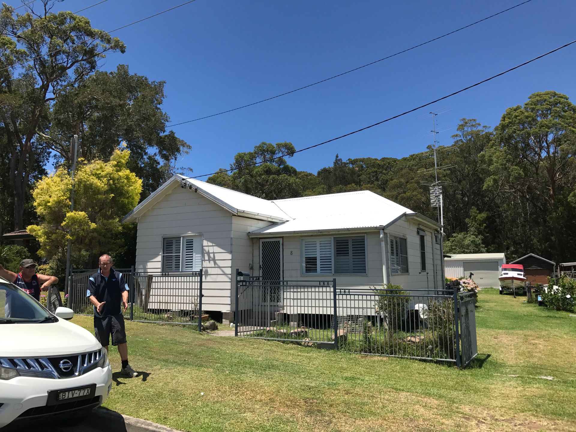 The Roof of a Building With a Blue Sky in the Background — Norwest Roof Restorations In Blue Bay, NSW
