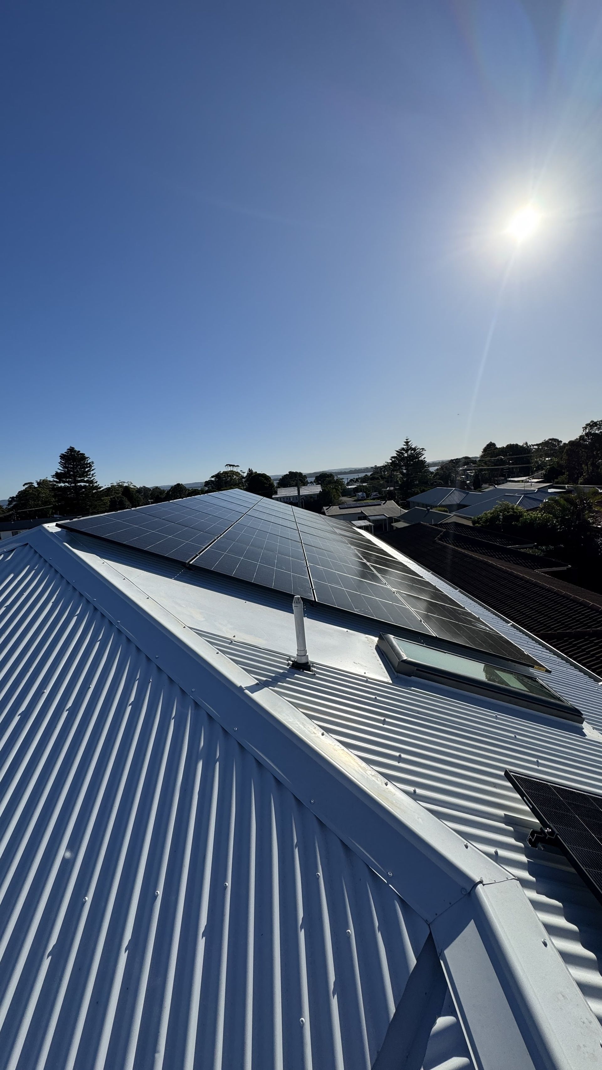Solar Panels Mounted on a Metal Roof — Norwest Roof Restorations In Blue Bay, NSW