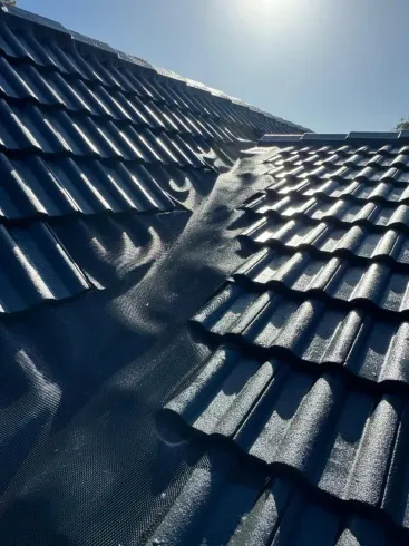 Concrete Tile Roof in central coast Restored With a New darker colour