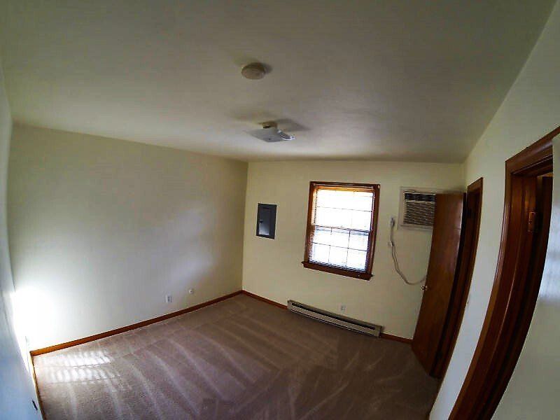 3rd Bay St Apartments bed room
