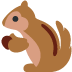 Chipmunk holding a nut, brown and tan fur, dark eye.