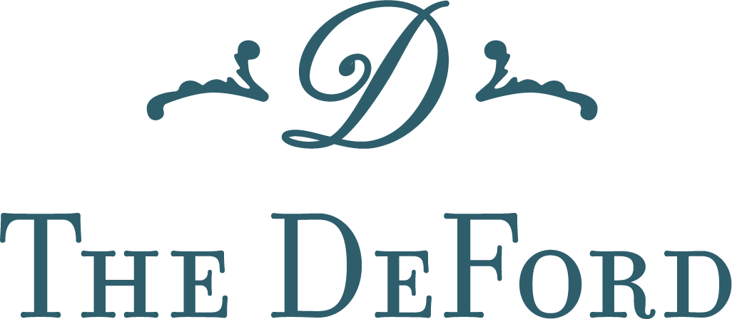 Logo: teal stylized
