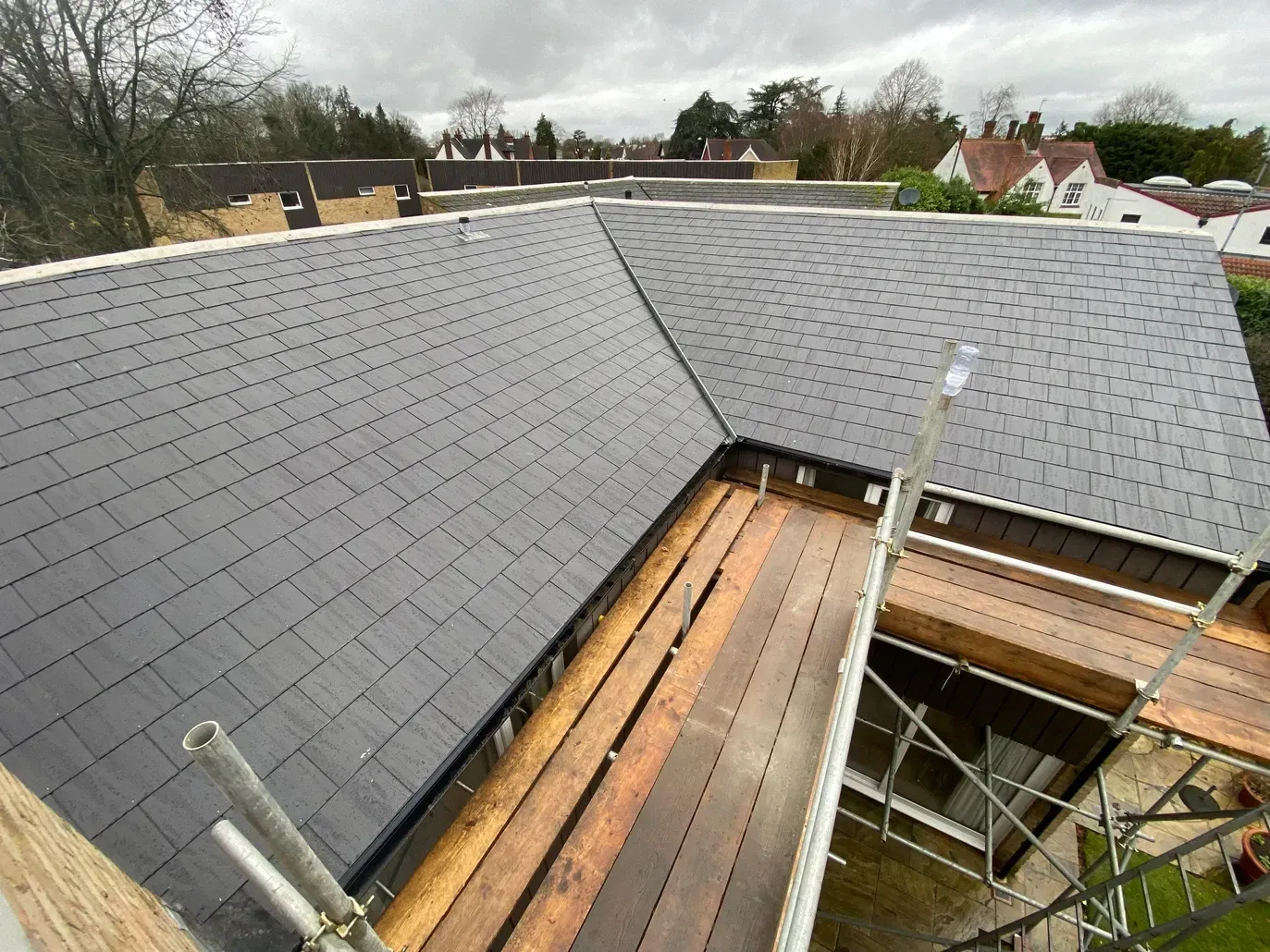 An aerial view of a roof with scaffolding on it.
