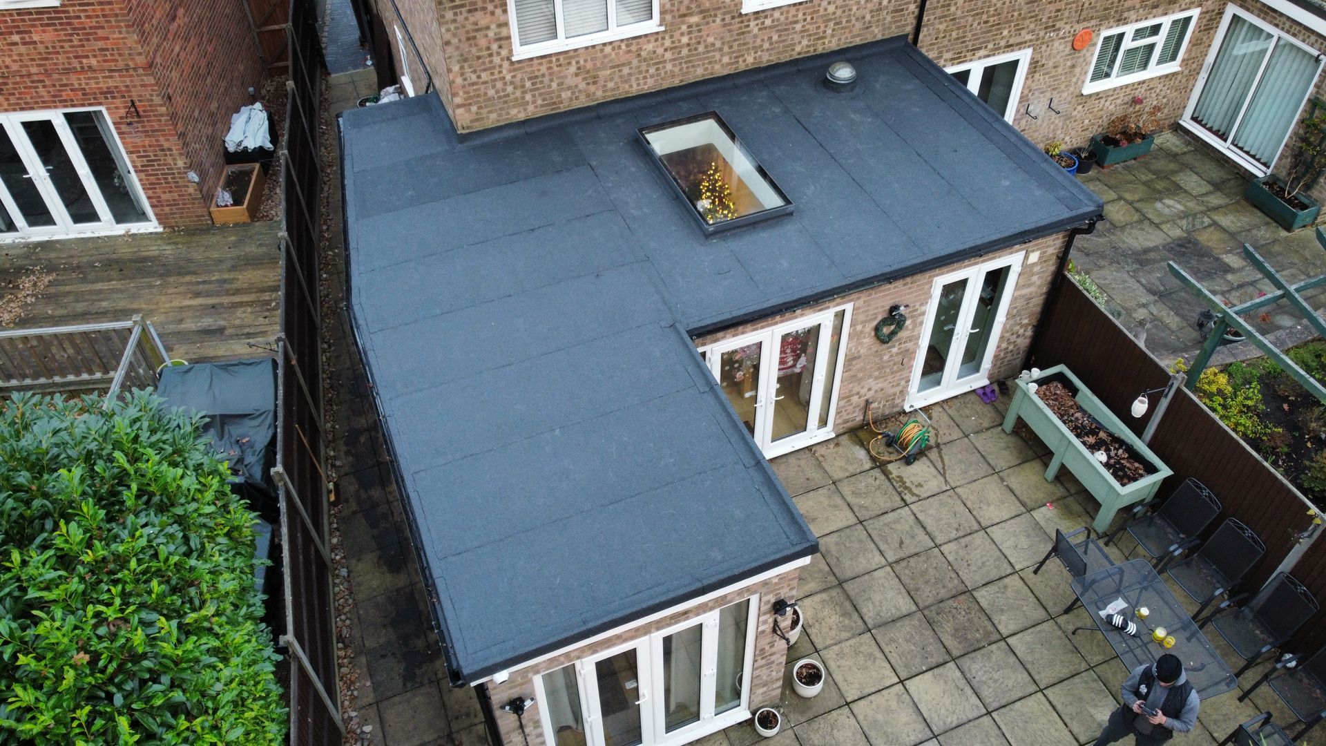 an aerial view of a house with a flat roof .