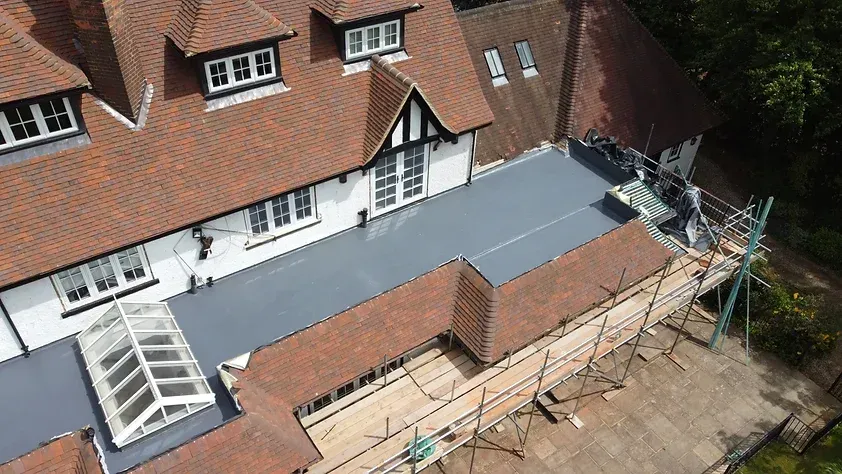 rear of large country house roofing project