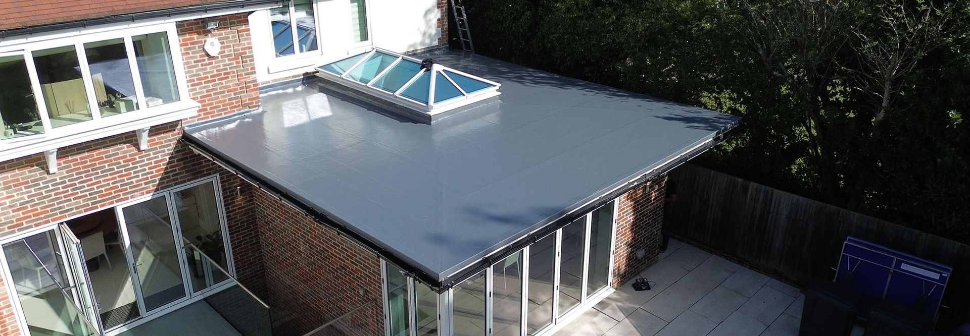 large flat roof installation on rear home extension