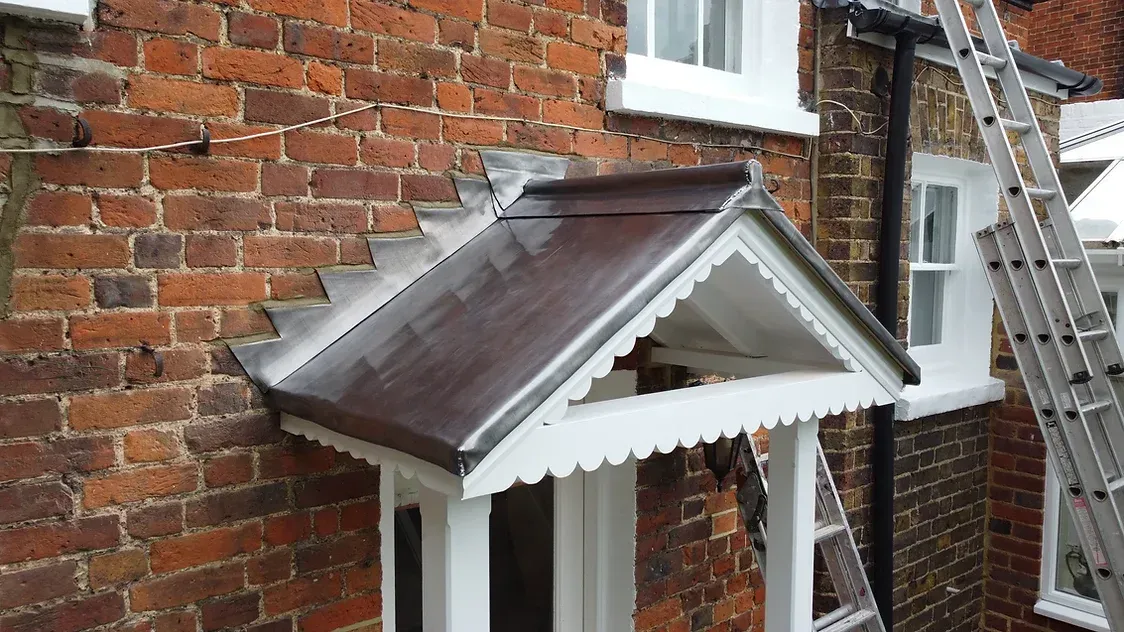 front door with leadwork flashing