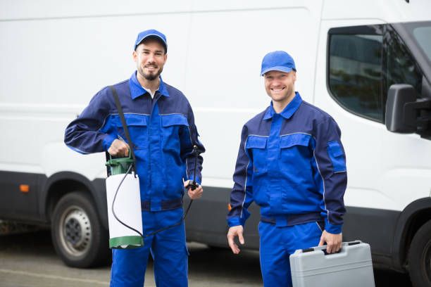 Portrait of two pest control workers
