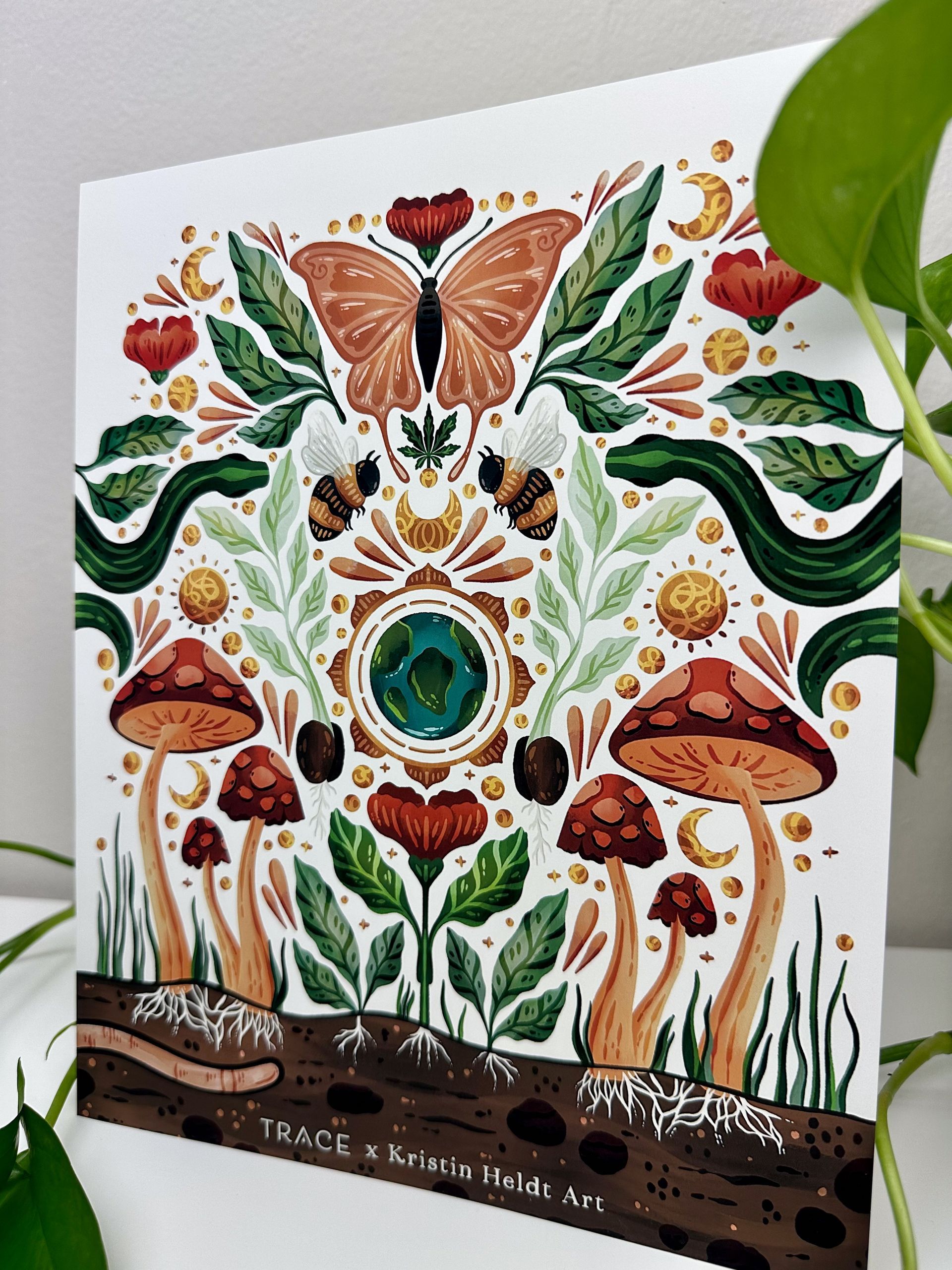 A painting of a butterfly surrounded by mushrooms and flowers