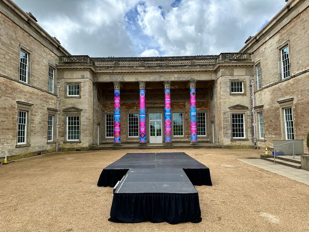 Modular stage set up inside a courtyard of a country house