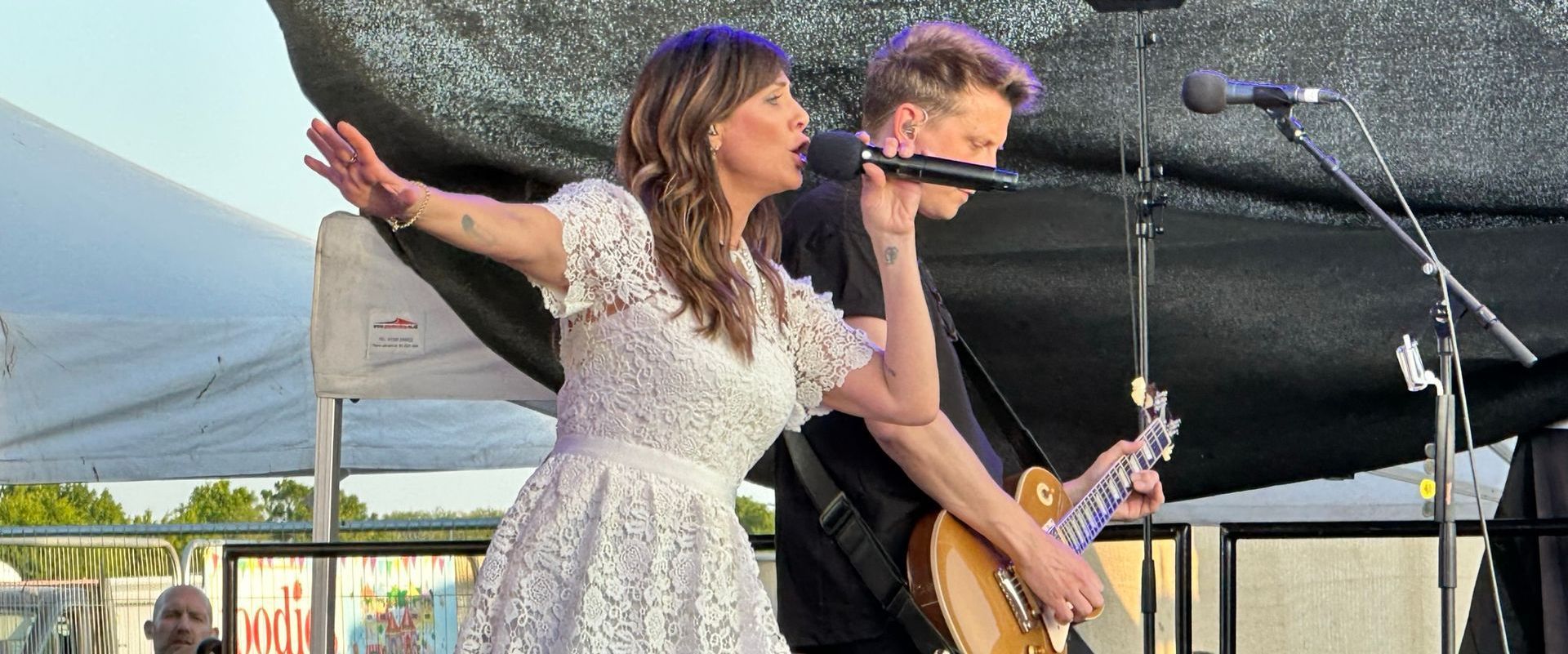 a photo of natalie Imbruglia in a white dress at Foodies Festival in St Albans