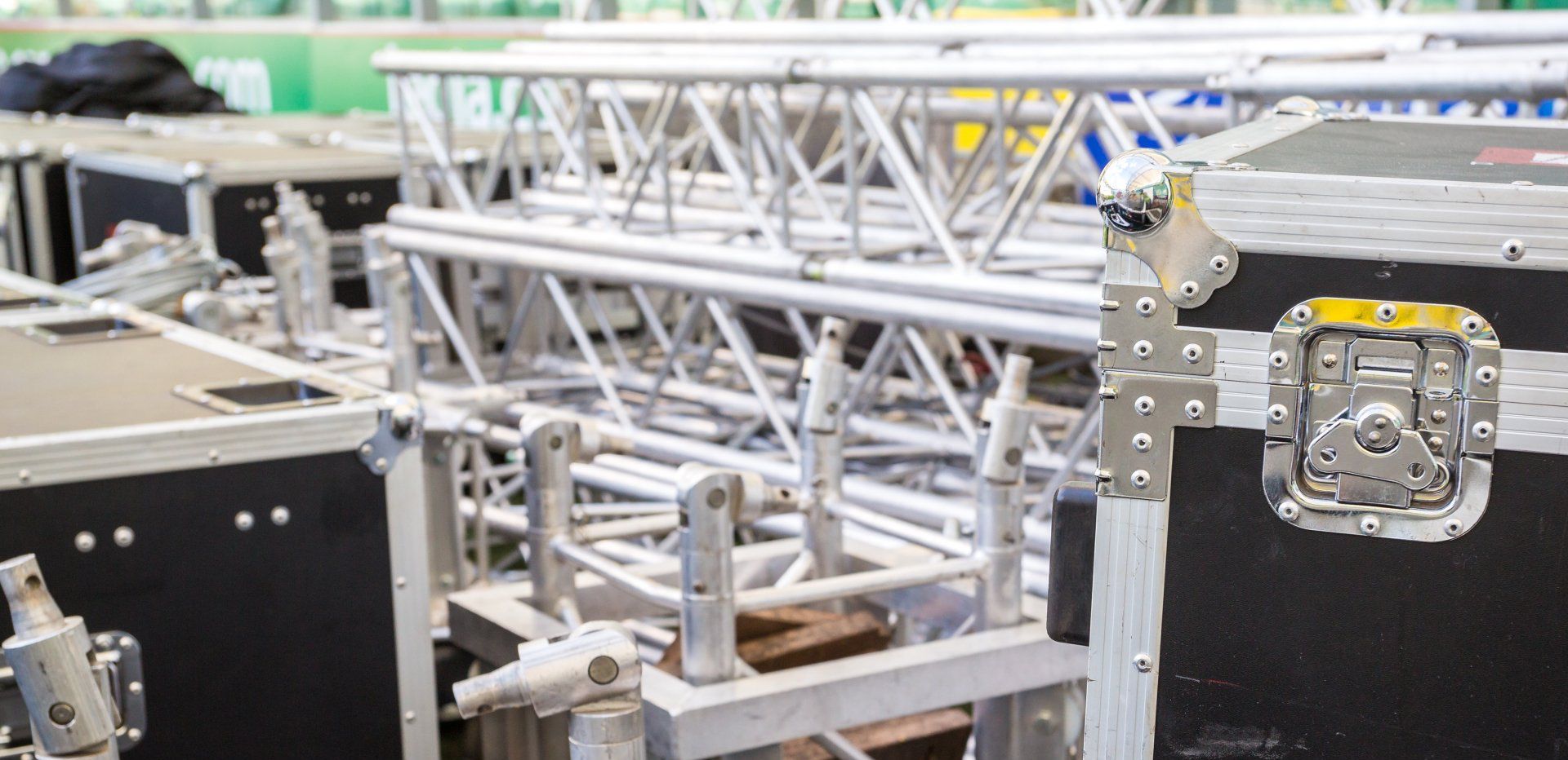 A shot of flights cases and staging strutts stored in a warehouse