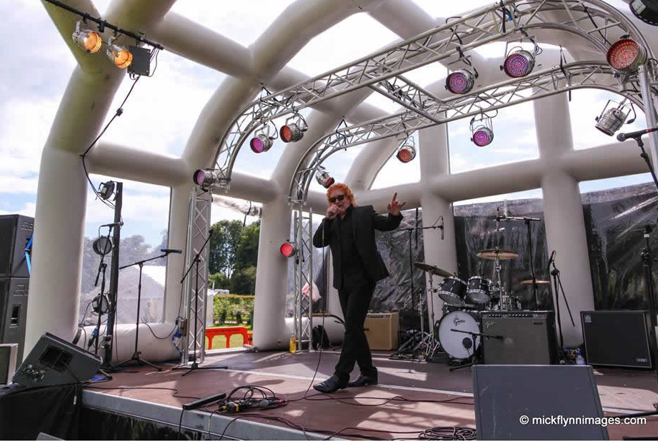 performer on Inflatable roof stage set up for an outdoor event