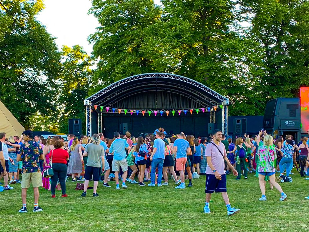 Arc truss stage at a festival for long term hire