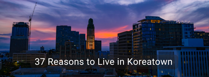 Cityscape at dusk with text