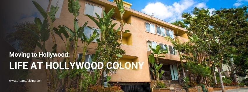 Building with tropical plants and text that says 