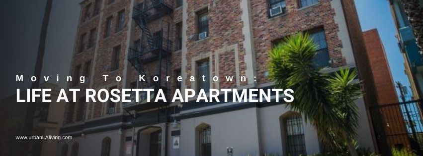An apartment building exterior with text reading 