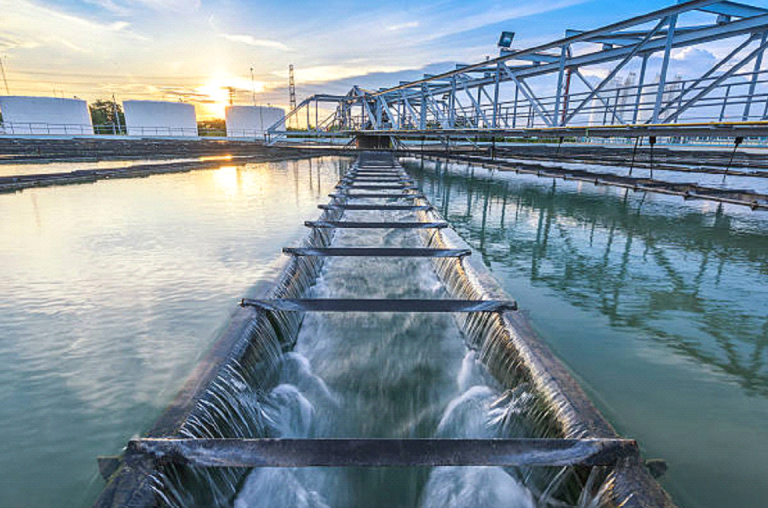 A water treatment plant with water flowing through a pipe.