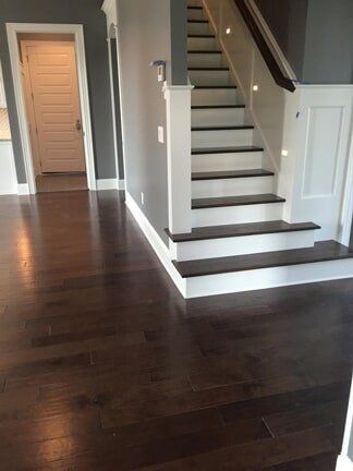 Dark Colored Laminated Floor — Greenville, NC — East Carolina Carpets & Interiors
