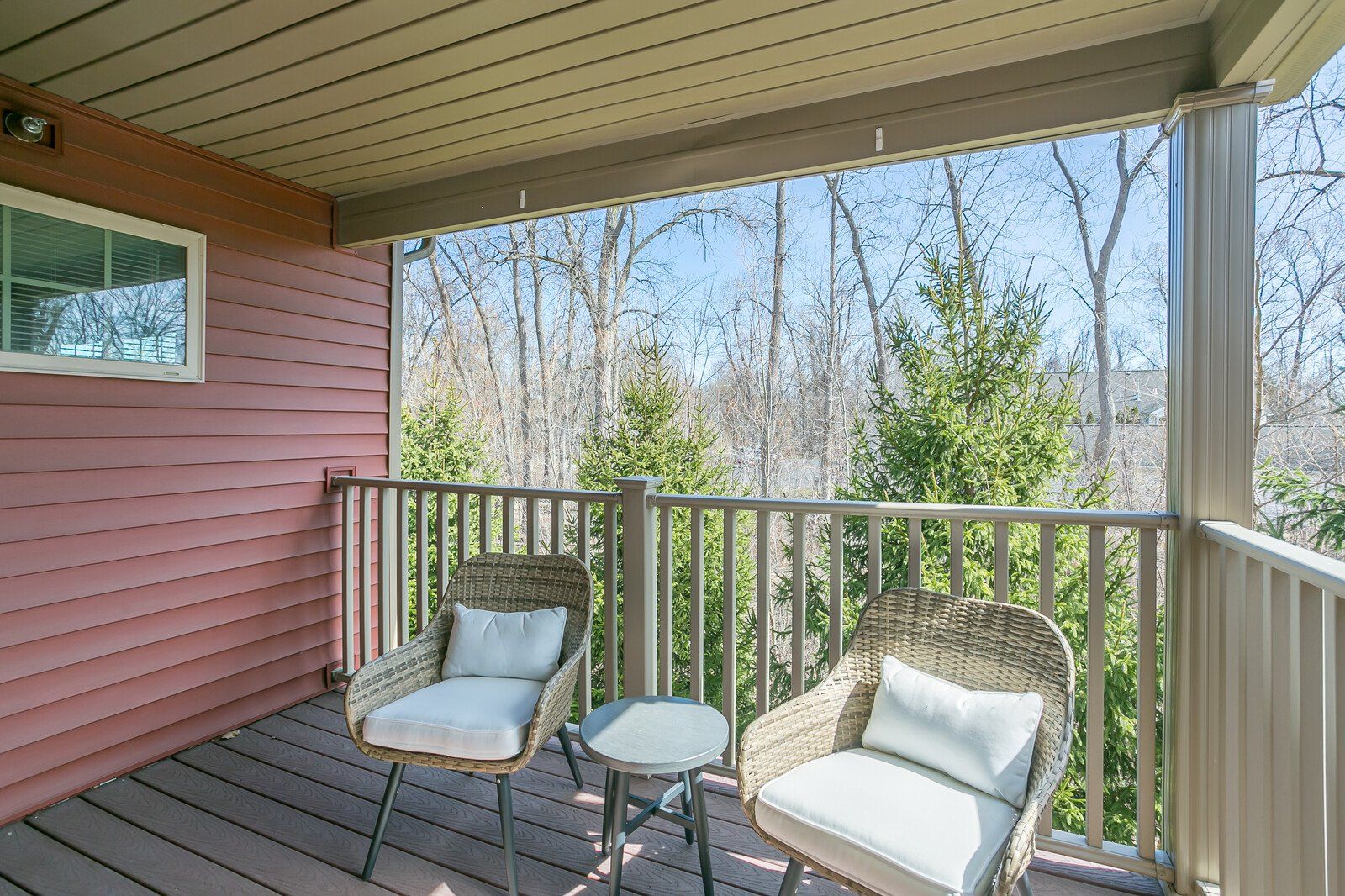 Balcony overlooking wooded area