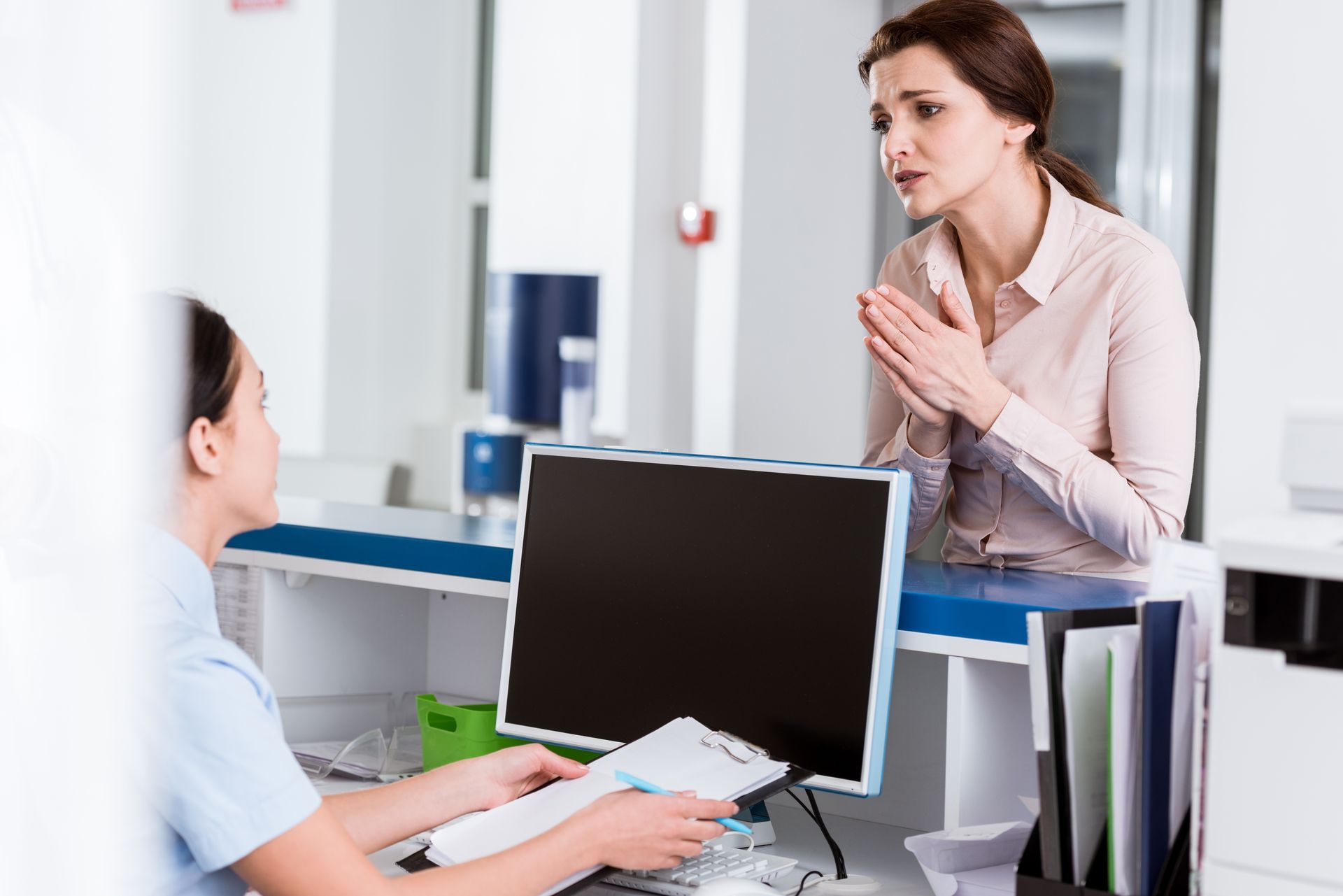 sad-patient-talking-to-nurse-with-please-gesture-2026-03-13-01-19-07-utc.jpg