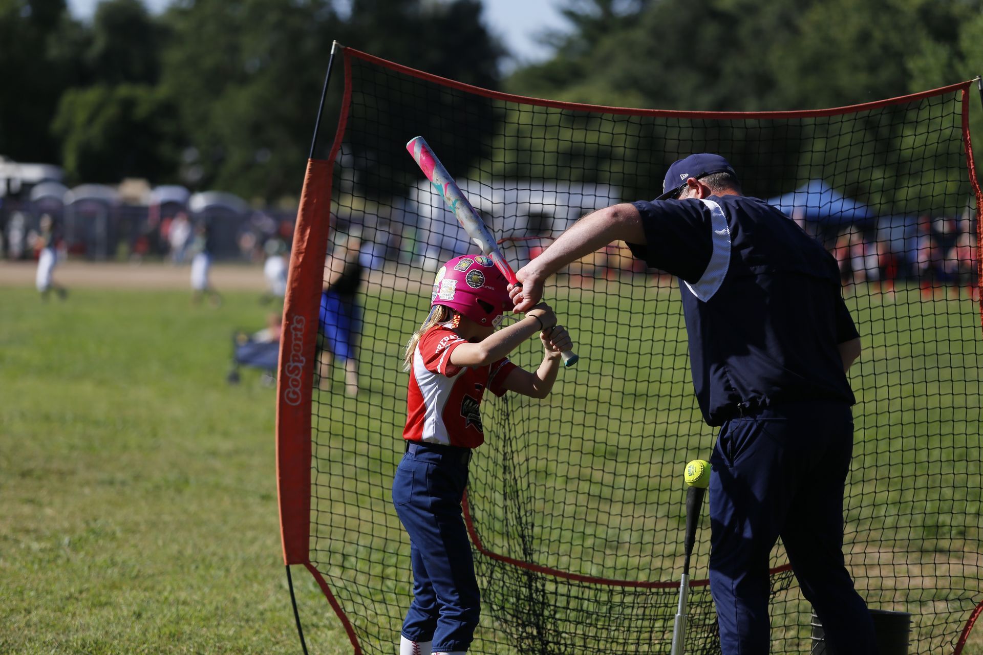 volunteers coach in blue shirt 
