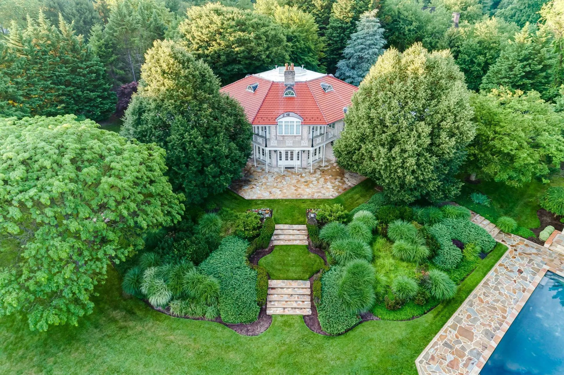Aerial drone shot of residential property on large lot