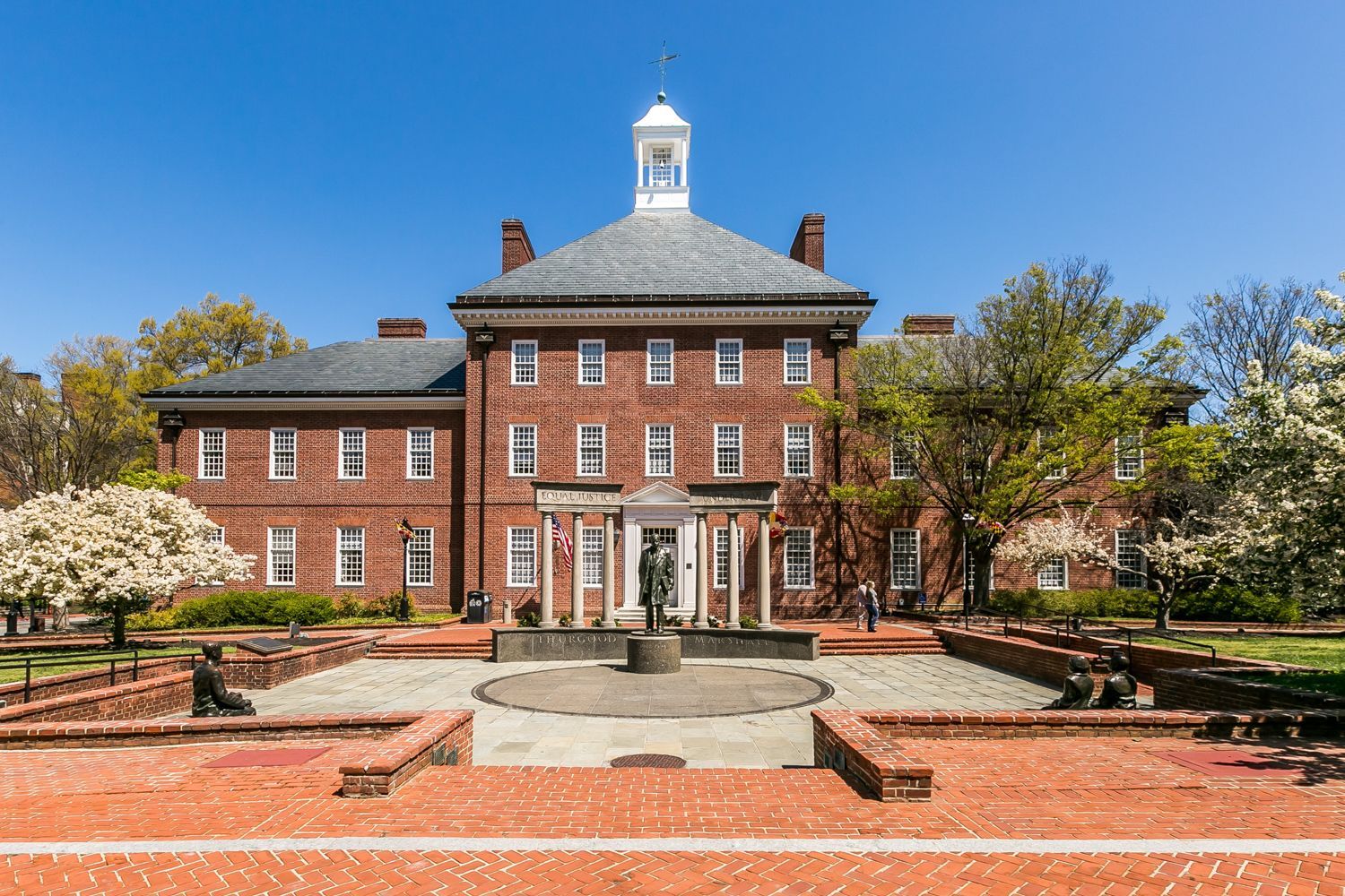 Annapolis, Maryland - A beautiful large brick building home with front fountain. Photo shoot by Craig Westerman