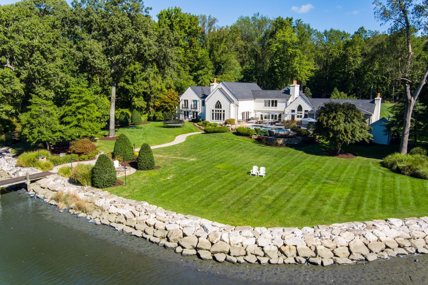 Aerial Drone shoot by Craig Westerman looking over rear view of luxury home on the water in Annapolis, Maryland.