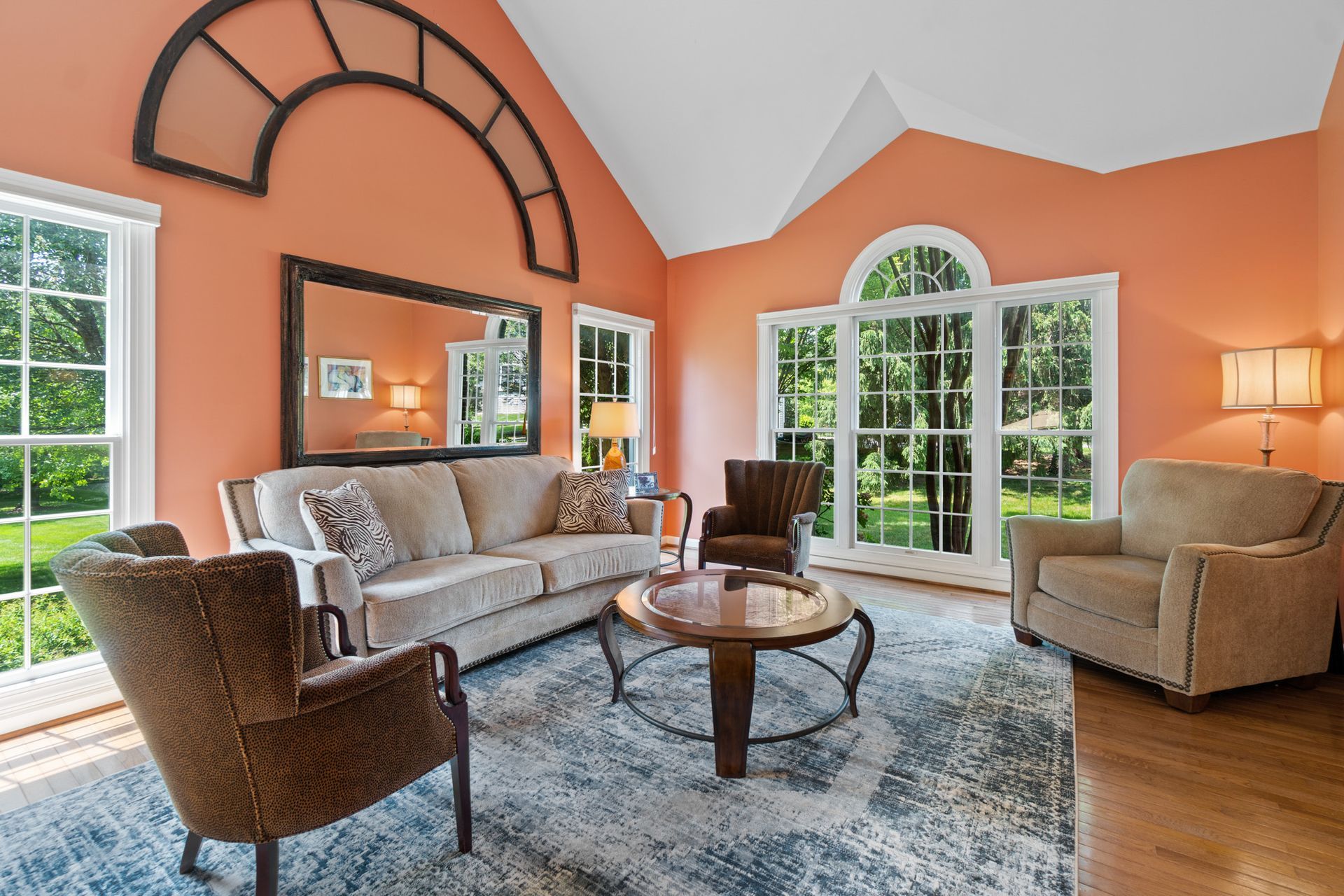 Beautiful orange wall painting living room photo shoot by Craig Westerman and team in Clarksville, Maryland