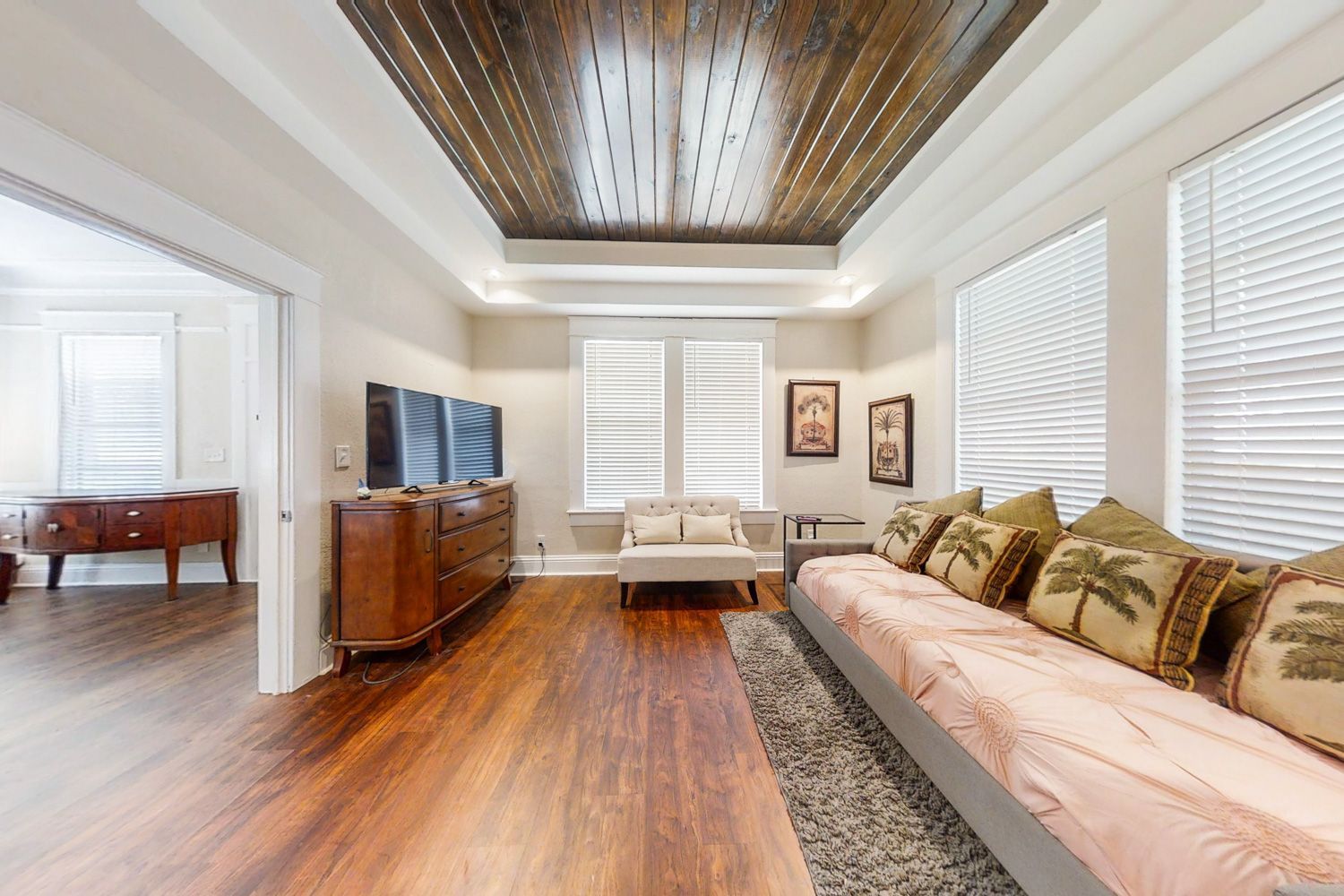 A living room with a couch and a television in Tampa, Florida by Craig Westerman
