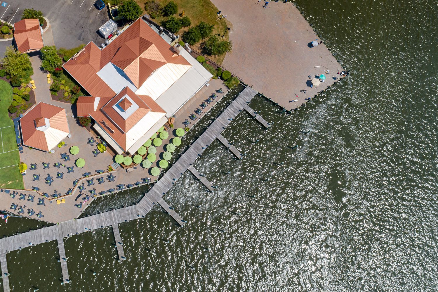 an aerial drone videography of a home next to kent island coast line