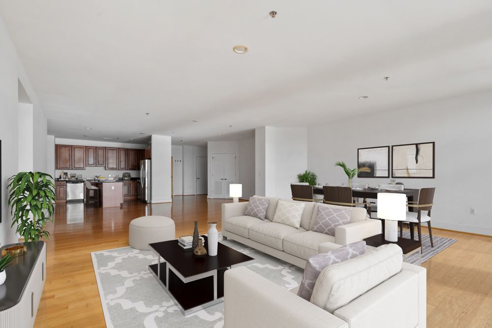 A living room with a couch and a coffee table