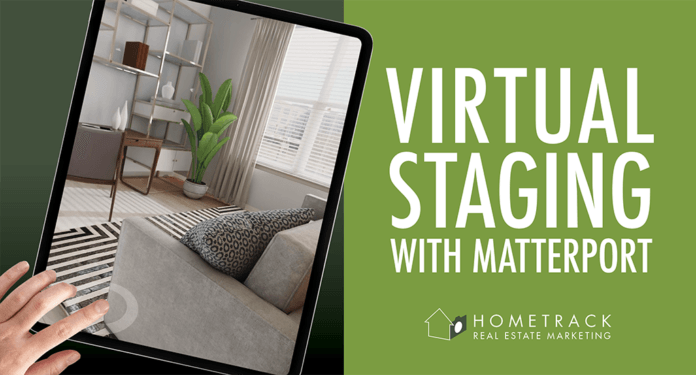 A person is holding a tablet with a living room on it.