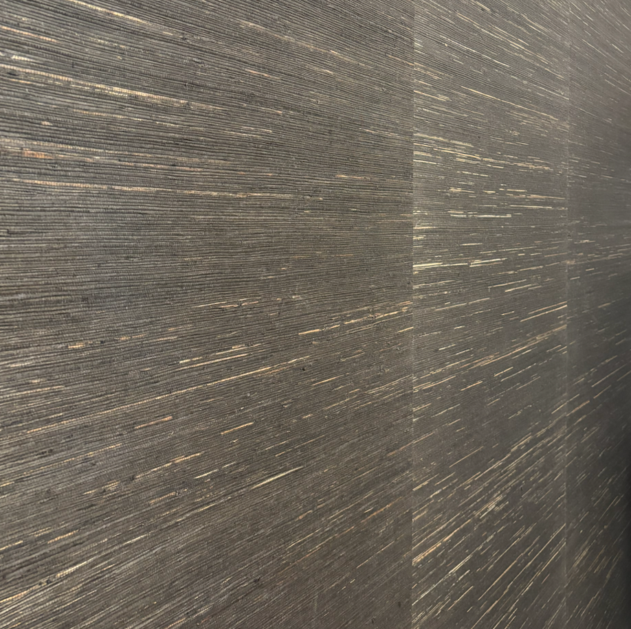A close up of a wall with a striped pattern