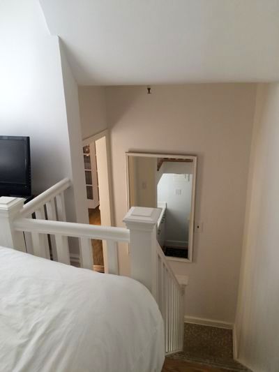 stairs going down from loft