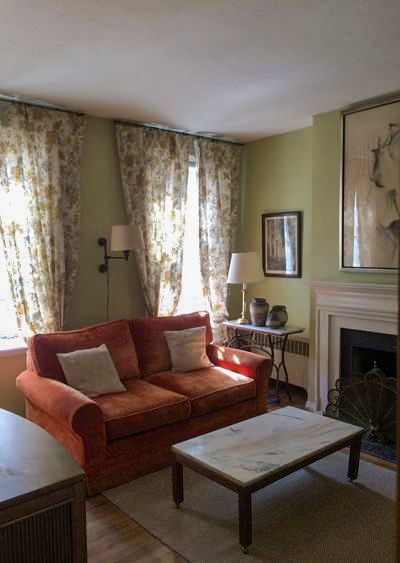 a living room with a couch and a coffee table