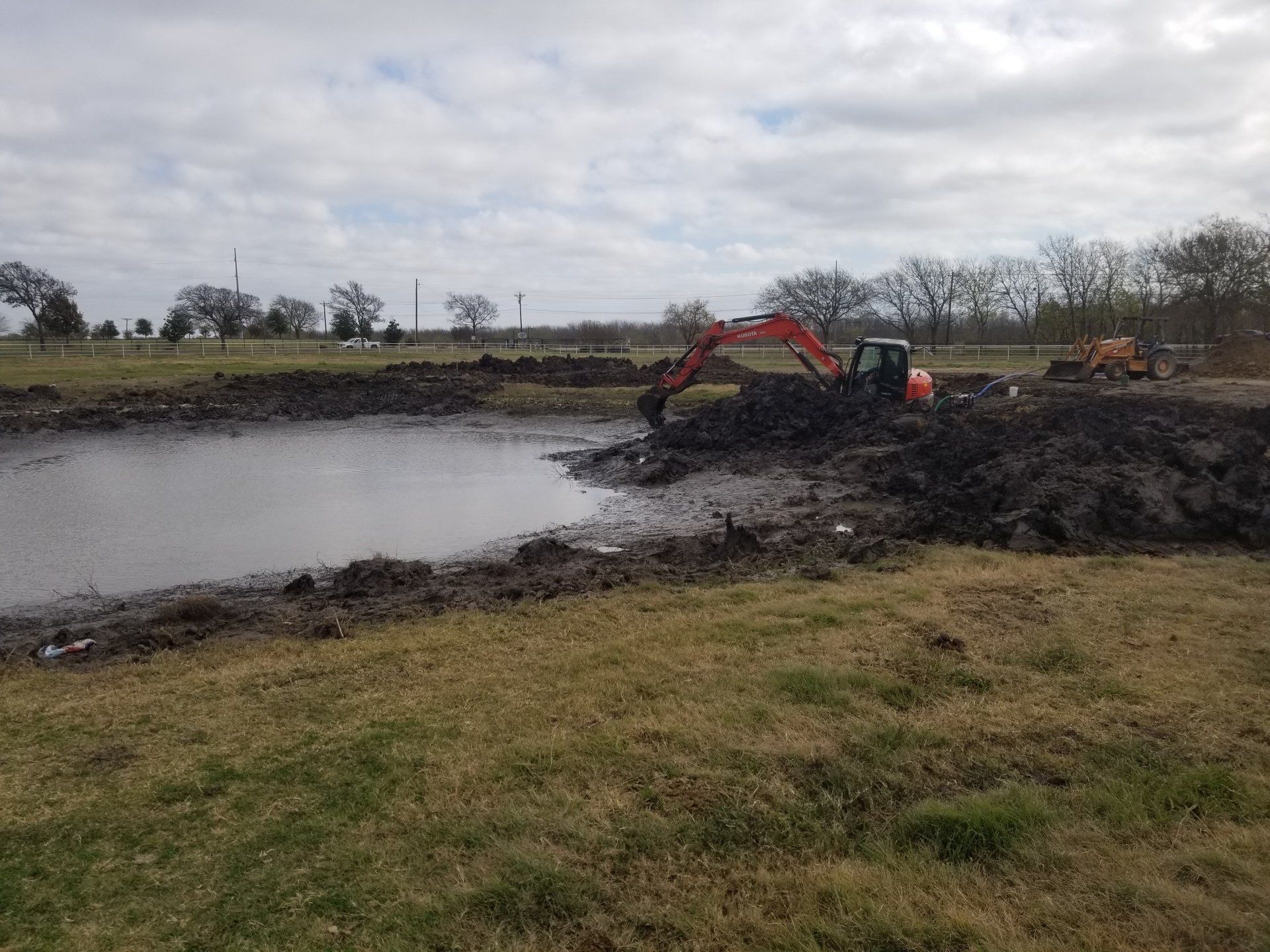 Excavator Truck Removing Soil - Dallas, TX - All Around Septic Service Co