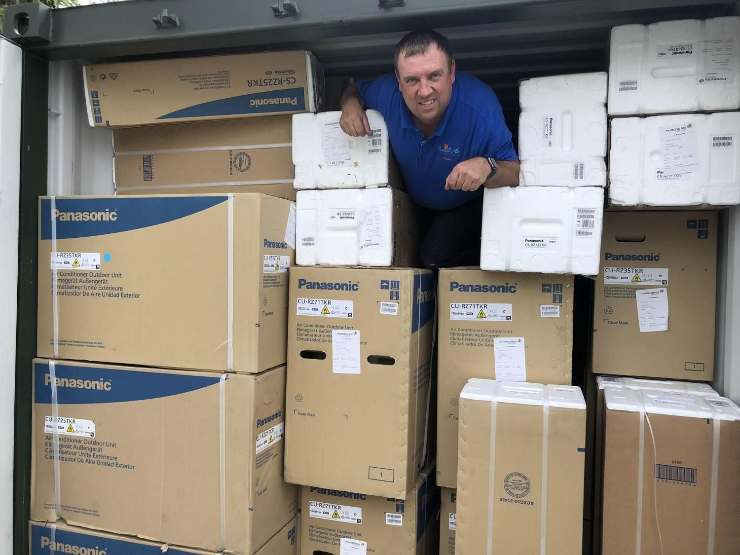 A Man Peeking out From a Container Packed — Careda Air in Saint Georges Basin, NSW