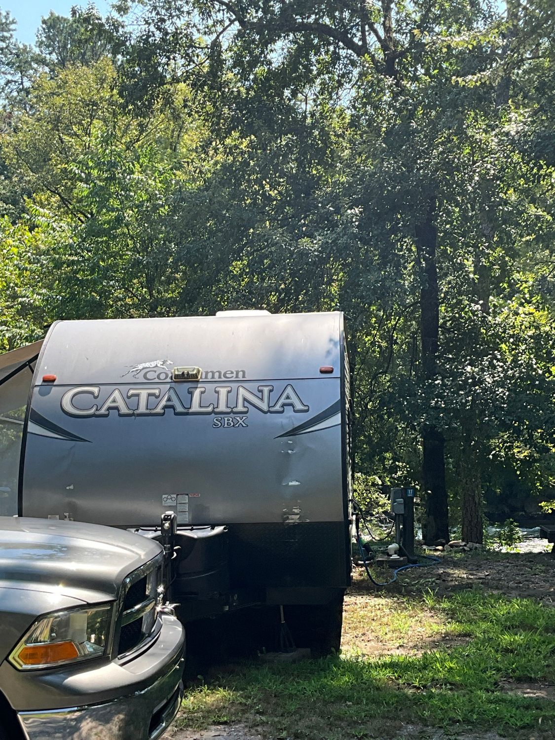 A gray RV trailer, 
