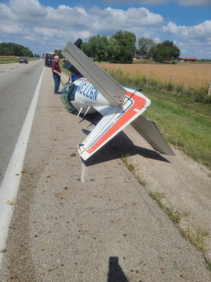 A small plane has crashed on the side of the road