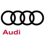 The audi logo is black and red on a white background.