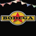 A bodega logo with a red star in a yellow circle on a black background.