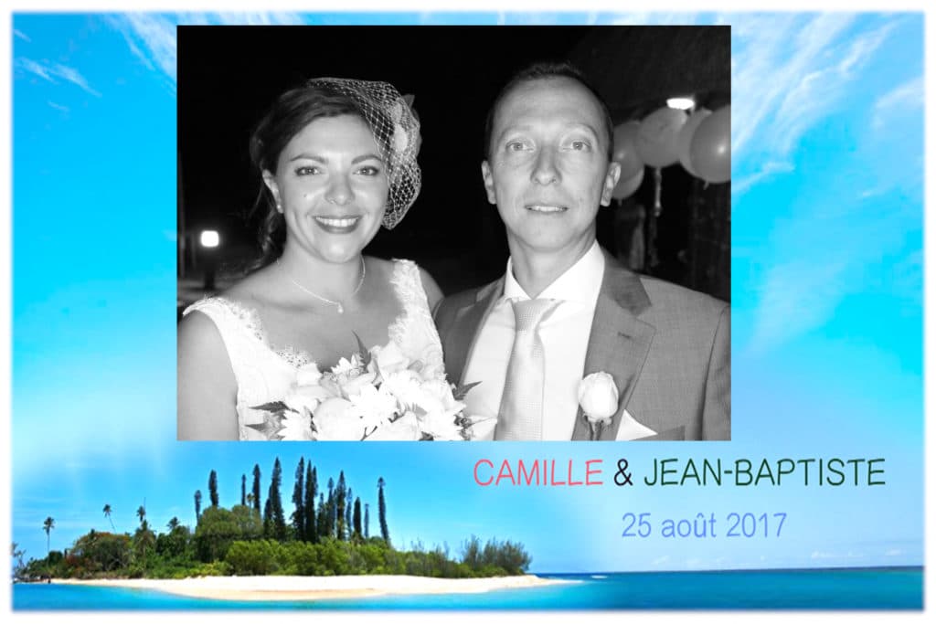 A black and white photo of a bride and groom