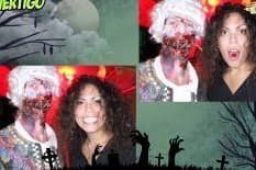 A woman is standing next to a man dressed as a zombie.