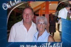 A man and a woman are posing for a picture together.