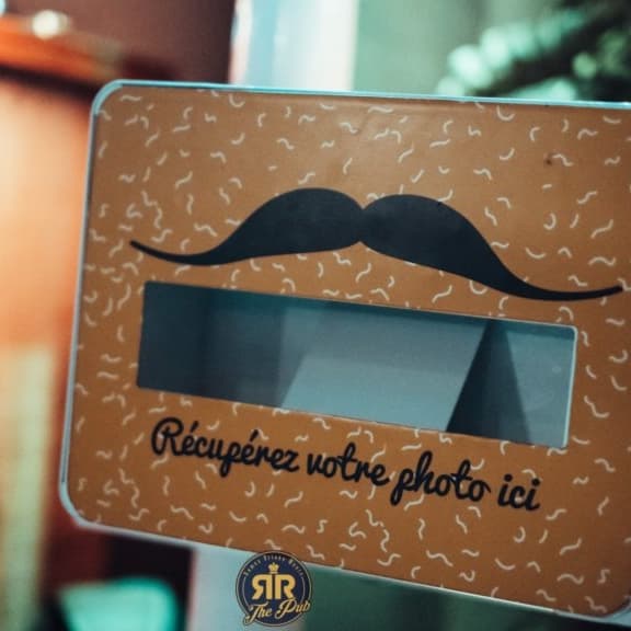 A card with a mustache on it that says